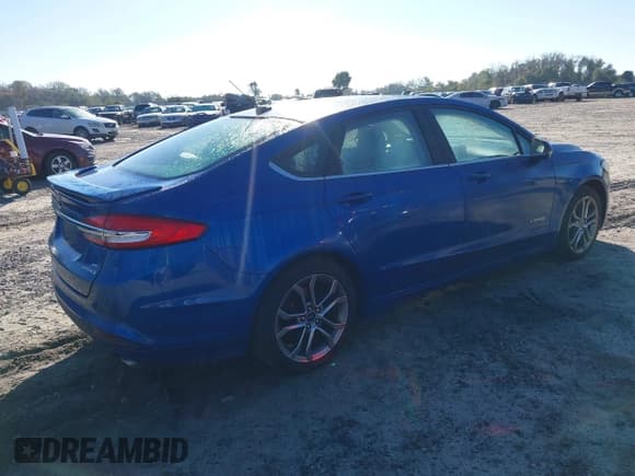 ✅ 2017 Ford Fusion Hybrid SE • VIN: 3FA6P0LU2HR382361 • Lot: 43474850. Listed on IAAI with 128,991 mi. Free auction sales archive from the USA and detailed vehicle history report at DreamBid. Image 4.