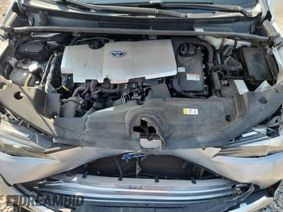 2021 Toyota Prius L Eco with VIN JTDKAMFU1M3150517, listed as a Copart auction lot 70697765 with 107,800 mi miles and Salvage title. Bid and sale history available at DreamBid. Image 11.