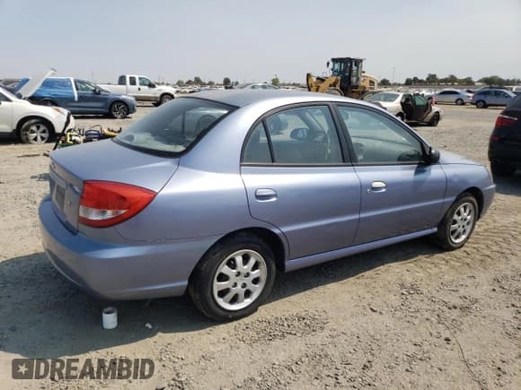 ✅ 2003 Kia Rio • VIN: KNADC125336204930 • Лот: 71482095. Опубликован ранее на Copart с пробегом 163 361 миль. Бесплатный доступ к архиву аукционных продаж из США и подробный отчёт об истории автомобиля на DreamBid. Изображение 3.