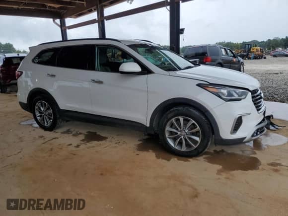 2017 Hyundai Santa Fe SE с VIN KM8SMDHF1HU226173, выставлен на аукционе Copart как лот 68544205 с пробегом 103 190 миль миль и Списание • Salvage title. История ставок и продаж доступна на DreamBid. Изображение 4.