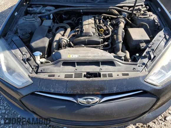 2014 Hyundai Genesis Coupe R-Spec z VIN KMHHT6KD0EU113794, wystawiony jako Copart lot #88302105 z przebiegiem 135 529 mil mil oraz Czysty tytuł • Clean title. Historia ofert i sprzedaży dostępna na DreamBid. Obrazek 11.