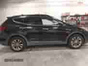 2017 Hyundai Santa Fe 2.0T z VIN 5XYZUDLA9HG433491, wystawiony jako IAAI lot #43298379 z przebiegiem 135 099 mil mil oraz . Historia ofert i sprzedaży dostępna na DreamBid. Obrazek 13.