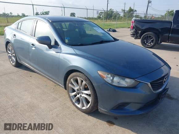 ✅ 2014 Mazda 6 i Touring • VIN: JM1GJ1V64E1119881 • Lot: 42293577. Listed on IAAI with 162,148 mi. Free auction sales archive from the USA and detailed vehicle history report at DreamBid. Image 1.