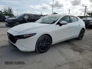 ✅ 2022 Mazda 3 Premium • VIN: JM1BPAMLXN1518598 • Lot: 60121785. Listed on Copart with 50,949 mi. Free auction sales archive from the USA and detailed vehicle history report at DreamBid. Image 1.