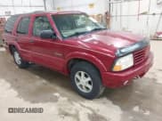 ✅ 1999 Oldsmobile Bravada • VIN: 1GHDT13W9X2701952 • Lot: 42093184. Wystawiony na IAAI z przebiegiem 121 532 mil. Bezpłatny archiwum sprzedaży aukcyjnych z USA i szczegółowy raport historii pojazdu na DreamBid. Zdjęcie 1.