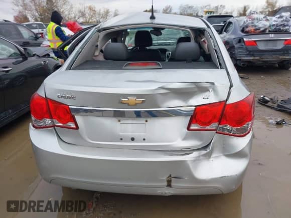 2014 Chevrolet Cruze 2LT with VIN 1G1PE5SB0E7135532, listed as a IAAI auction lot 43507178 with 100,363 mi miles and . Bid and sale history available at DreamBid. Image 17.