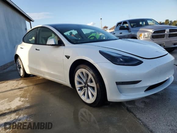 ✅ 2022 Tesla Model 3 Long Range • VIN: 5YJ3E1EBXNF181454 • Lot: 74084454. Listed on Copart with Not provided. Free auction sales archive from the USA and detailed vehicle history report at DreamBid. Image 4.