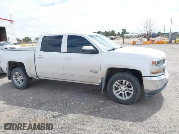 ✅ 2018 Chevrolet Silverado 1500 LT • VIN: 3GCPCREHXJG339211 • Лот: 42553890. Опубликован ранее на IAAI с пробегом 124 513 миль. Бесплатный доступ к архиву аукционных продаж из США и подробный отчёт об истории автомобиля на DreamBid. Изображение 13.
