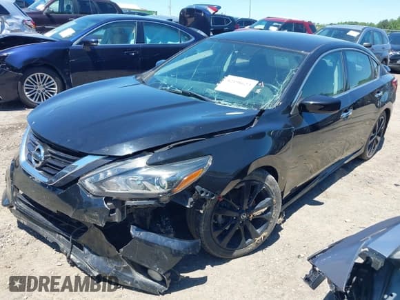 ✅ 2017 Nissan Altima SL • VIN: 1N4AL3AP4HC218516 • Lot: 42198623. Listed on IAAI with 86,084 mi. Free auction sales archive from the USA and detailed vehicle history report at DreamBid. Image 2.
