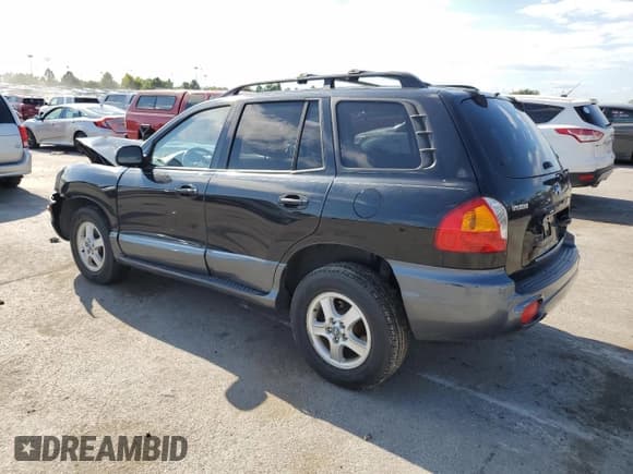 ✅ 2004 Hyundai Santa Fe GLS • VIN: KM8SC73D14U597368 • Lot: 71244955. Listed on Copart with 86,930 mi. Free auction sales archive from the USA and detailed vehicle history report at DreamBid. Image 2.