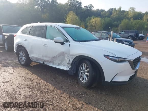 ✅ 2016 Mazda CX-9 Sport • VIN: JM3TCBBYXG0113183 • Lot: 43275398. Listed on IAAI with 67,799 mi. Free auction sales archive from the USA and detailed vehicle history report at DreamBid. Image 1.