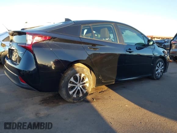 ✅ 2021 Toyota Prius L Eco • VIN: JTDKAMFU5M3146454 • Lot: 43462876. Wystawiony na IAAI z przebiegiem 93 810 mil. Bezpłatny archiwum sprzedaży aukcyjnych z USA i szczegółowy raport historii pojazdu na DreamBid. Zdjęcie 4.