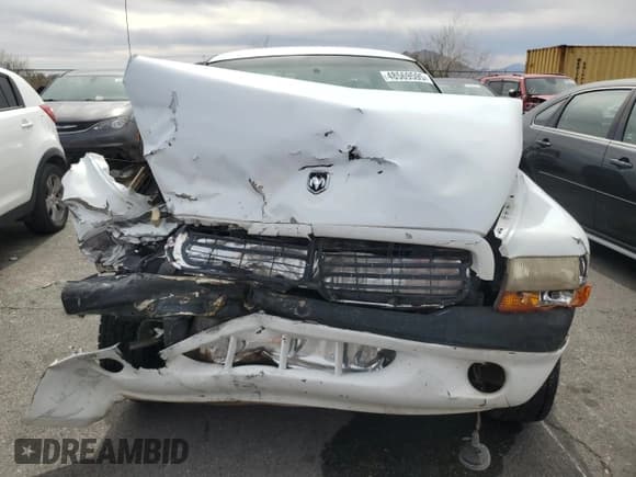 ✅ 1998 Dodge Dakota SLT • VIN: 1B7GL22X0WS654957 • Lot: 48569595. Wystawiony na Copart z przebiegiem Nie podano. Bezpłatny archiwum sprzedaży aukcyjnych z USA i szczegółowy raport historii pojazdu na DreamBid. Zdjęcie 5.