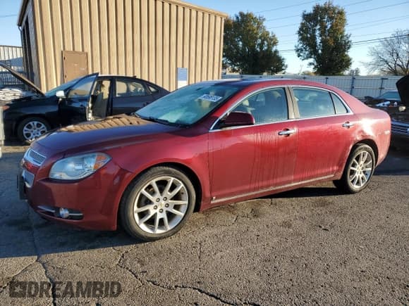 ✅ 2010 Chevrolet Malibu LTZ • VIN: 1G1ZE5E79AF131303 • Лот: 90698135. Опубликован ранее на Copart с пробегом 99 314 миль. Бесплатный доступ к архиву аукционных продаж из США и подробный отчёт об истории автомобиля на DreamBid. Изображение 1.