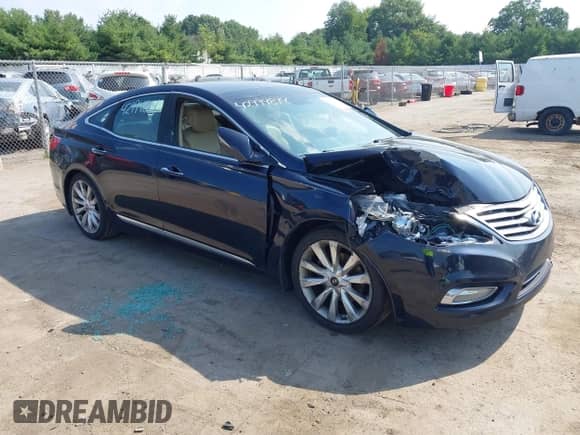 2013 Hyundai Azera z VIN KMHFH4JGXDA225432, wystawiony jako IAAI lot #42994814 z przebiegiem 151 934 mil mil oraz . Historia ofert i sprzedaży dostępna na DreamBid. Obrazek 1.