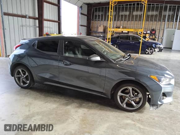 2020 Hyundai Veloster 2.0 z VIN KMHTG6AF9LU032050, wystawiony jako Copart lot #80888004 z przebiegiem 120 643 mil mil oraz Czysty tytuł • Clean title. Historia ofert i sprzedaży dostępna na DreamBid. Obrazek 4.