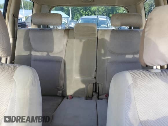 2003 Toyota Highlander z VIN JTEHD21A030024485, wystawiony jako Copart lot #69210235 z przebiegiem 169 016 mil mil oraz Szkoda całkowita • Salvage title. Historia ofert i sprzedaży dostępna na DreamBid. Obrazek 10.