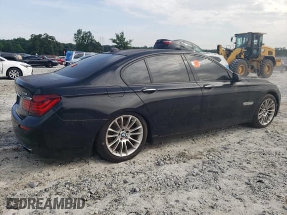 ✅ 2013 BMW 7 Series 750i • VIN: WBAYA8C58DC996414 • Lot: 62928835. Listed on Copart with 174,807 mi. Free auction sales archive from the USA and detailed vehicle history report at DreamBid. Image 3.