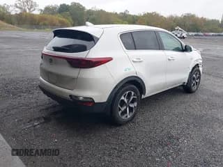 ✅ 2020 Kia Sportage LX • VIN: KNDPMCAC9L7765202 • Лот: 43410284. Опубликован ранее на IAAI с пробегом 99 434 миль. Бесплатный доступ к архиву аукционных продаж из США и подробный отчёт об истории автомобиля на DreamBid. Изображение 4.