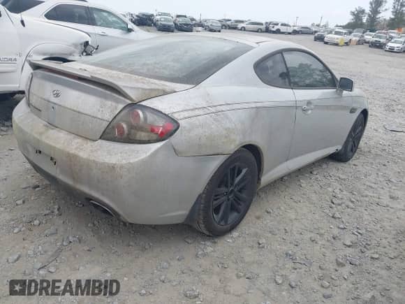 2008 Hyundai Tiburon GS с VIN KMHHM66D68U264666, выставлен на аукционе IAAI как лот 41970123 с пробегом 186 448 миль миль и . История ставок и продаж доступна на DreamBid. Изображение 4.