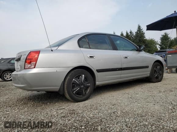 ✅ 2005 Hyundai Elantra GLS • VIN: KMHDN46D15U998837 • Lot: 71613155. Listed on Copart with 244,257 mi. Free auction sales archive from the USA and detailed vehicle history report at DreamBid. Image 3.