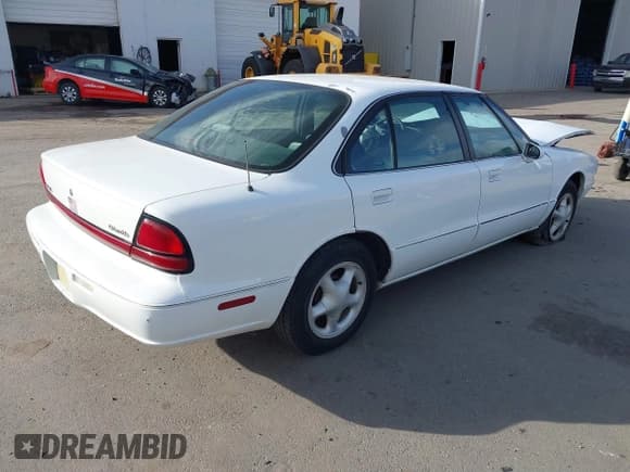 ✅ 1999 Oldsmobile 88 LS • VIN: 1G3HN52K0X4837561 • Lot: 41414590. Listed on IAAI with 211,565 mi. Free auction sales archive from the USA and detailed vehicle history report at DreamBid. Image 4.