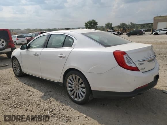 ✅ 2015 Lincoln MKS • VIN: 1LNHL9DK0FG601091 • Lot: 67738325. Wystawiony na Copart z przebiegiem 128 997 mil. Bezpłatny archiwum sprzedaży aukcyjnych z USA i szczegółowy raport historii pojazdu na DreamBid. Zdjęcie 2.