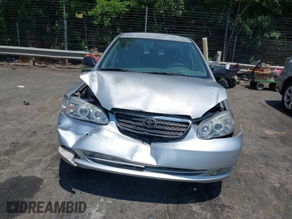 ✅ 2005 Toyota Corolla CE • VIN: JTDBR32E250055971 • Lot: 42660536. Listed on IAAI with 299,999 mi. Free auction sales archive from the USA and detailed vehicle history report at DreamBid. Image 12.