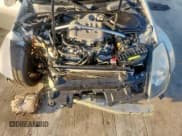 ✅ 2005 Nissan 350Z • VIN: JN1AZ34D05M605342 • Лот: 69046905. Опубликован ранее на Copart с пробегом 84 516 миль. Бесплатный доступ к архиву аукционных продаж из США и подробный отчёт об истории автомобиля на DreamBid. Изображение 11.