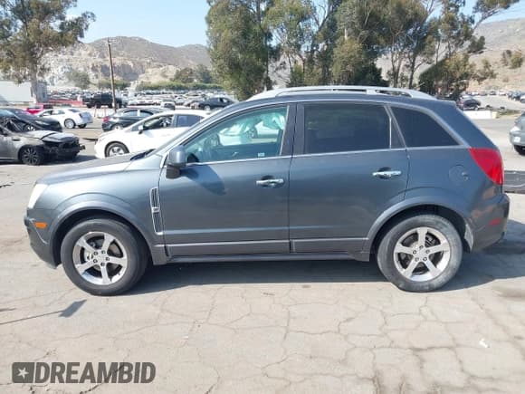 ✅ 2013 Chevrolet Captiva Sport LT • VIN: 3GNAL3EK4DS581063 • Lot: 42111098. Wystawiony na IAAI z przebiegiem 178 301 mil. Bezpłatny archiwum sprzedaży aukcyjnych z USA i szczegółowy raport historii pojazdu na DreamBid. Zdjęcie 14.