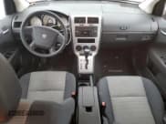 ✅ 2009 Dodge Caliber SXT • VIN: 1B3HB48A99D208760 • Лот: 85921224. Опубликован ранее на Copart с пробегом Не указан. Бесплатный доступ к архиву аукционных продаж из США и подробный отчёт об истории автомобиля на DreamBid. Изображение 8.