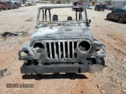 ✅ 2000 Jeep Wrangler Sahara • VIN: 1J4FA59S9YP718555 • Lot: 49660795. Wystawiony na Copart z przebiegiem Nie podano. Bezpłatny archiwum sprzedaży aukcyjnych z USA i szczegółowy raport historii pojazdu na DreamBid. Zdjęcie 5.