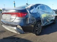 ✅ 2023 Kia Forte LXS • VIN: 3KPF24AD6PE647341 • Lot: 43346999. Listed on IAAI with 56,441 mi. Free auction sales archive from the USA and detailed vehicle history report at DreamBid. Image 4.