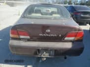 ✅ 1997 Nissan Maxima GXE • VIN: JN1CA21D3VT817964 • Lot: 77006234. Listed on Copart with 242,557 mi. Free auction sales archive from the USA and detailed vehicle history report at DreamBid. Image 6.