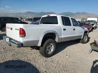 2001 Dodge Dakota Sport z VIN 1B7HG2AN71S260163, wystawiony jako Copart lot #68867304 z przebiegiem 250 426 mil mil oraz Szkoda całkowita • Salvage title. Historia ofert i sprzedaży dostępna na DreamBid. Obrazek 3.