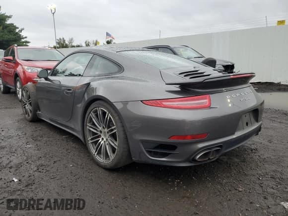 ✅ 2015 Porsche 911 Turbo S • VIN: WP0AD2A92FS167121 • Лот: 74240874. Опубликован ранее на Copart с пробегом 45 013 миль. Бесплатный доступ к архиву аукционных продаж из США и подробный отчёт об истории автомобиля на DreamBid. Изображение 2.