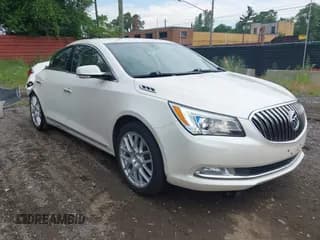 ✅ 2014 Buick LaCrosse Premium I • VIN: 1G4GD5G36EF226642 • Лот: 42611309. Опубликован ранее на IAAI с пробегом 137 206 миль. Бесплатный доступ к архиву аукционных продаж из США и подробный отчёт об истории автомобиля на DreamBid. Изображение 1.