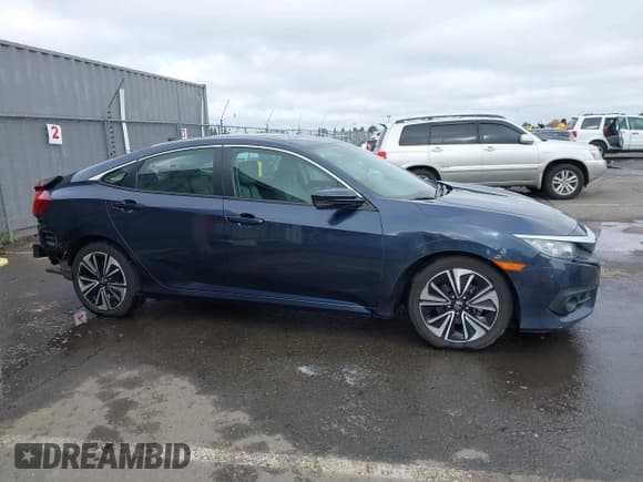 ✅ 2016 Honda Civic EX-T • VIN: 19XFC1F31GE221326 • Lot: 43764254. Listed on IAAI with 140,904 mi. Free auction sales archive from the USA and detailed vehicle history report at DreamBid. Image 14.