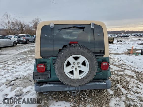 ✅ 2001 Jeep Wrangler Sahara • VIN: 1J4FA59S01P310998 • Лот: 94724805. Опубликован ранее на Copart с пробегом 113 902 миль. Бесплатный доступ к архиву аукционных продаж из США и подробный отчёт об истории автомобиля на DreamBid. Изображение 6.