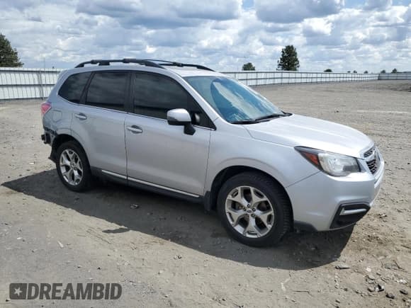 ✅ 2017 Subaru Forester Touring • VIN: JF2SJATC9HH812042 • Lot: 59775235. Listed on Copart with 146,779 mi. Free auction sales archive from the USA and detailed vehicle history report at DreamBid. Image 4.