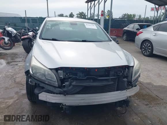 2016 Chevrolet Malibu LS z VIN 1G11B5SA9GF115925, wystawiony jako IAAI lot #43315728 z przebiegiem 108 708 mil mil oraz . Historia ofert i sprzedaży dostępna na DreamBid. Obrazek 13.