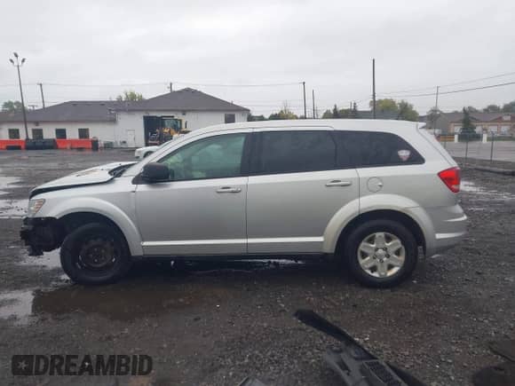 2012 Dodge Journey American Value with VIN 3C4PDCAB4CT154190, listed as a IAAI auction lot 43485900 with 161,305 mi miles and . Bid and sale history available at DreamBid. Image 14.