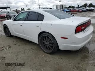 ✅ 2014 Dodge Charger SE • VIN: 2C3CDXBGXEH221570 • Lot: 82454525. Wystawiony na Copart z przebiegiem 154 799 mil. Bezpłatny archiwum sprzedaży aukcyjnych z USA i szczegółowy raport historii pojazdu na DreamBid. Zdjęcie 2.