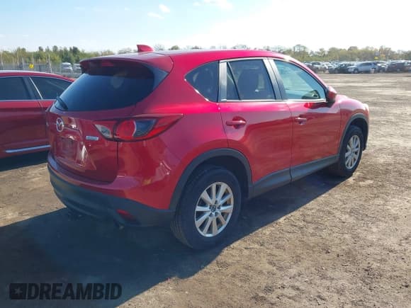 ✅ 2014 Mazda CX-5 Touring • VIN: JM3KE2CY9E0366805 • Lot: 43557677. Wystawiony na IAAI z przebiegiem 210 857 mil. Bezpłatny archiwum sprzedaży aukcyjnych z USA i szczegółowy raport historii pojazdu na DreamBid. Zdjęcie 4.