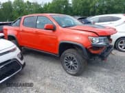 ✅ 2022 Chevrolet Colorado 4WD ZR2 • VIN: 1GCGTEEN1N1110502 • Лот: 42115890. Опубликован ранее на IAAI с пробегом 52 198 миль. Бесплатный доступ к архиву аукционных продаж из США и подробный отчёт об истории автомобиля на DreamBid. Изображение 1.