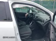 ✅ 2021 Chevrolet Trax LS • VIN: KL7CJNSB5MB326387 • Lot: 42402026. Listed on IAAI with 43,037 mi. Free auction sales archive from the USA and detailed vehicle history report at DreamBid. Image 5.