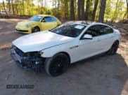 ✅ 2014 BMW 6 Series 650i • VIN: WBA6B2C59ED129617 • Lot: 43531691. Listed on IAAI with 113,536 mi. Free auction sales archive from the USA and detailed vehicle history report at DreamBid. Image 2.