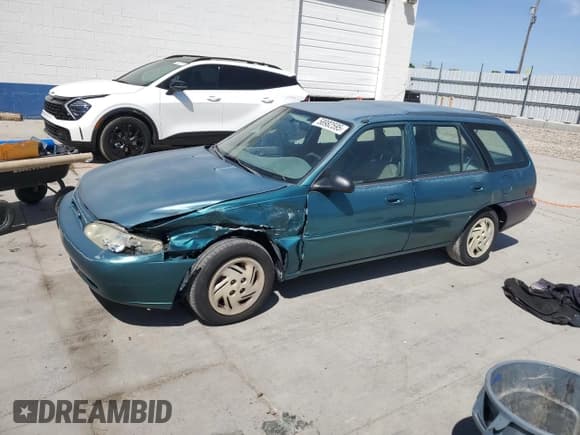 ✅ 1998 Ford Escort SE • VIN: 3FAFP15P5WR230715 • Lot: 58982595. Listed on Copart with 112,250 mi. Free auction sales archive from the USA and detailed vehicle history report at DreamBid. Image 1.