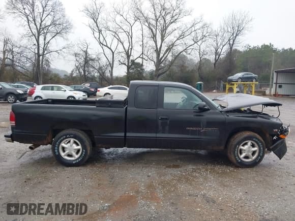 ✅ 1997 Dodge Dakota • VIN: 1B7GL23X2VS209651 • Lot: 41421859. Wystawiony na IAAI z przebiegiem 246 016 mil. Bezpłatny archiwum sprzedaży aukcyjnych z USA i szczegółowy raport historii pojazdu na DreamBid. Zdjęcie 13.