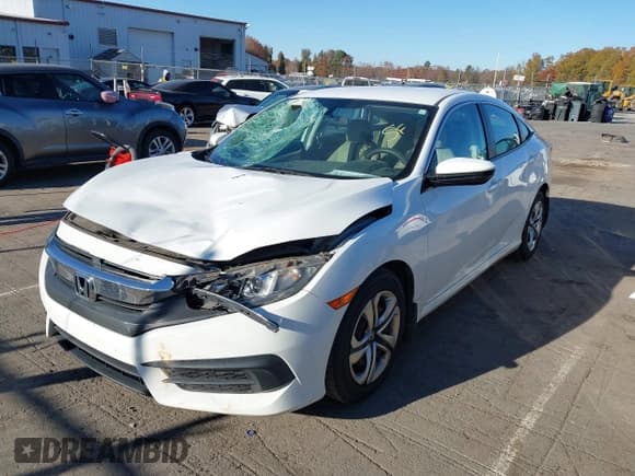 ✅ 2016 Honda Civic LX • VIN: 19XFC2F53GE033446 • Lot: 43710089. Wystawiony na IAAI z przebiegiem 127 517 mil. Bezpłatny archiwum sprzedaży aukcyjnych z USA i szczegółowy raport historii pojazdu na DreamBid. Zdjęcie 17.